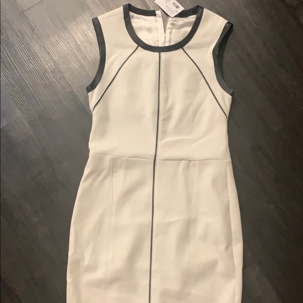 Beautiful white knee length Dress.